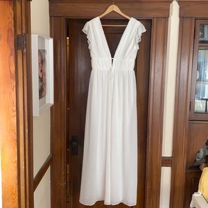 Beautiful white leg flowy white jumpsuit from Lulus